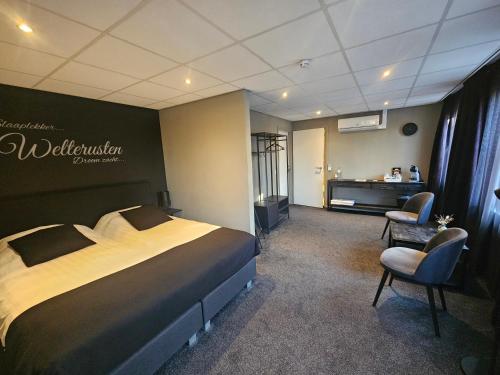 Postel nebo postele na pokoji v ubytování Hotel Café de Sport