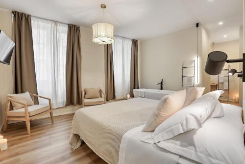 Ένα ή περισσότερα κρεβάτια σε δωμάτιο στο Wellness Suites