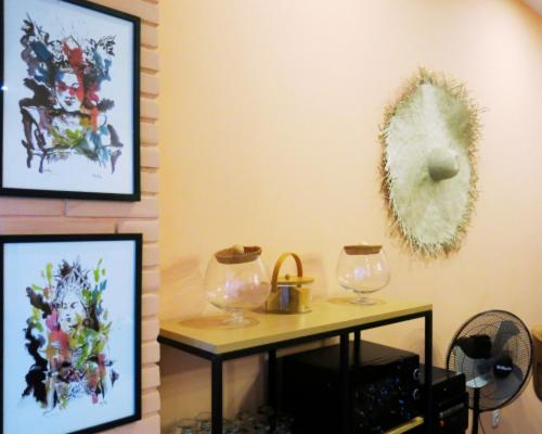 a room with two wine glasses on a table at apartement Puri 2 in Jimbaran