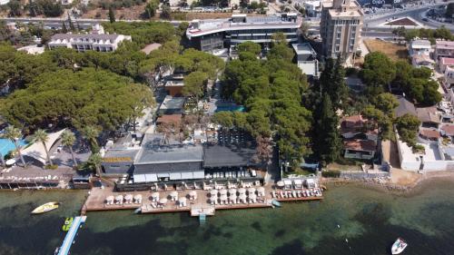 an aerial view of a mansion on the water at Unique Life Style Hotel in Kuşadası