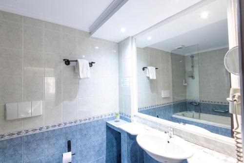 Koupelna v ubytování Royal by Euxin