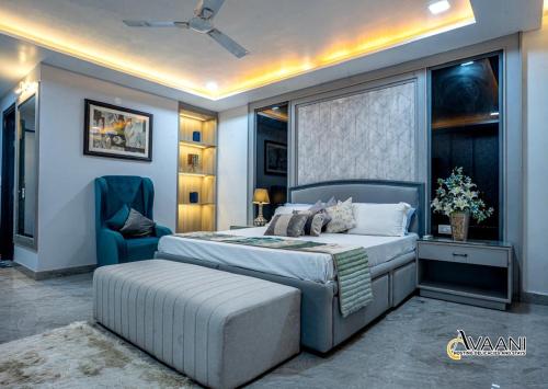Ένα ή περισσότερα κρεβάτια σε δωμάτιο στο Avaani Residency