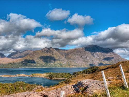 a view of a lake with mountains in the background at Tigh An Iasgair in Fearnmore