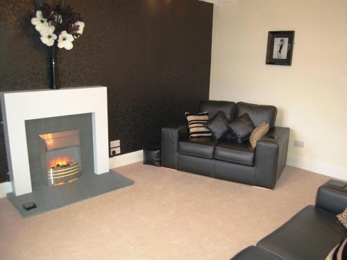 Posezení v ubytování 3 The Hollies