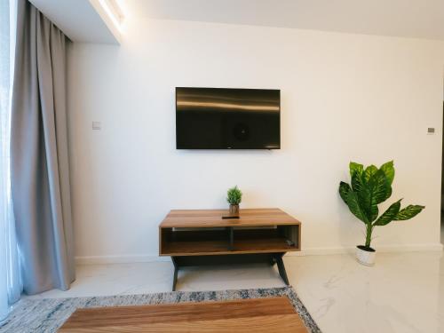 TV a/nebo společenská místnost v ubytování Grand Sapphire Hotel, Casino & Spa Holiday Deluxe Residential Home