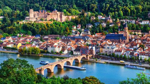 an aerial view of a city with a bridge over a river at Willkommen in Ihrem Luxus-Penthouse in Ziegelhausen
