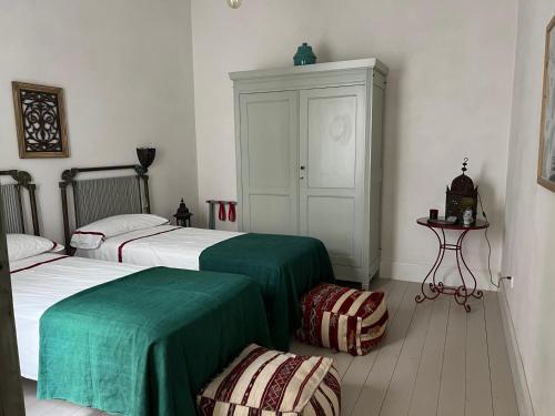 Ένα ή περισσότερα κρεβάτια σε δωμάτιο στο CASA PALACIO LAS MARÍAS by Andalusian Glory