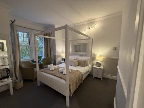 Postel nebo postele na pokoji v ubytování Central Hotel