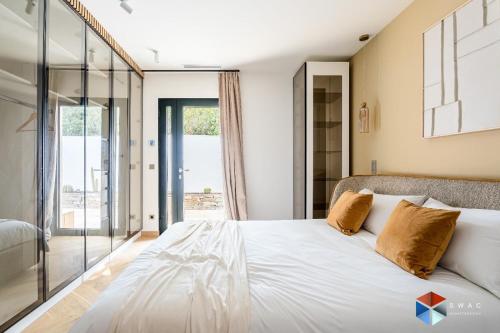 Postel nebo postele na pokoji v ubytování Villa Prestige Cassis