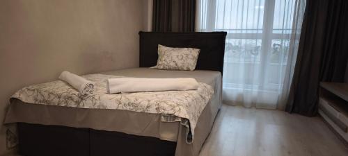 Ένα ή περισσότερα κρεβάτια σε δωμάτιο στο Studio 25 Hristo Stanechev 2- Dental University