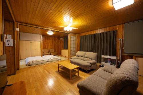 Postel nebo postele na pokoji v ubytování 空彩 -sorairo2- 札幌と富良野の中間