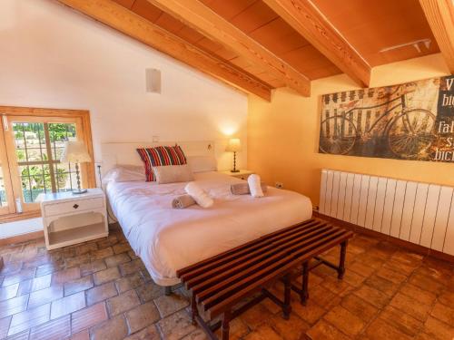 Кровать или кровати в номере Finca Tito y Yaya