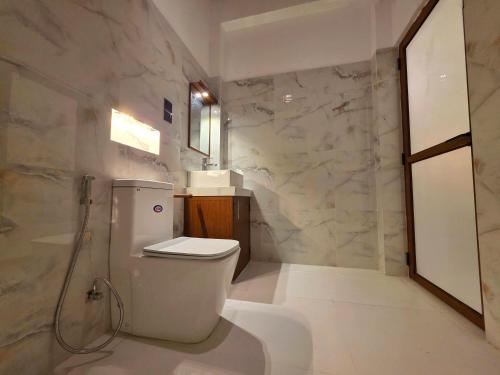 Koupelna v ubytování Sweden Inn Guesthouse