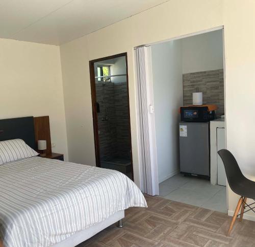 Postel nebo postele na pokoji v ubytování Colinas House