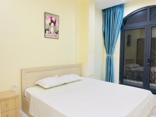 Ένα ή περισσότερα κρεβάτια σε δωμάτιο στο Lavender Cafe