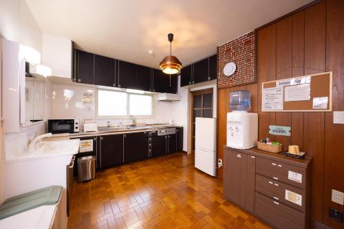 Kuchyň nebo kuchyňský kout v ubytování 空彩 -sorairo2- 札幌と富良野の中間