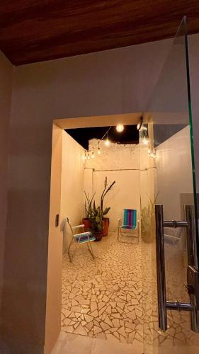a view of a room with two chairs and a table at Casa 678 in Belém