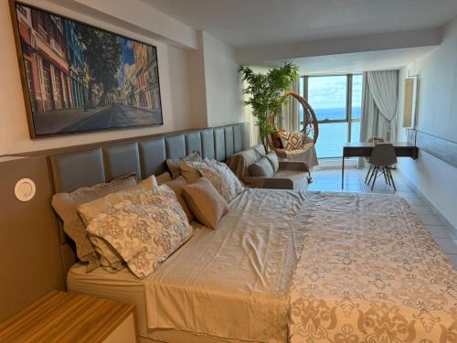 Ένα ή περισσότερα κρεβάτια σε δωμάτιο στο BCE Flat Beira Mar Boa Viagem