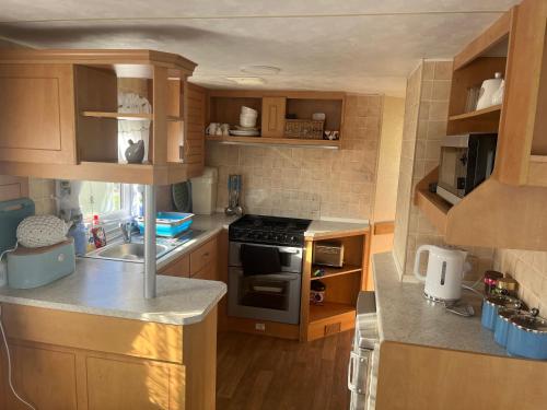 Kuchyň nebo kuchyňský kout v ubytování KC Caravans