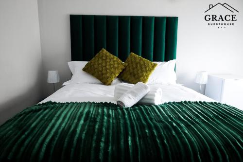 Ένα ή περισσότερα κρεβάτια σε δωμάτιο στο Grace guesthouse