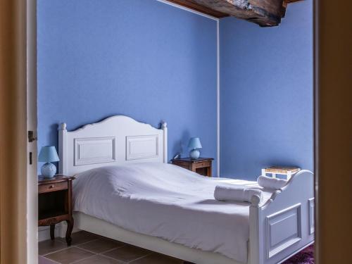 Postel nebo postele na pokoji v ubytování Maison de campagne au cœur des vignes