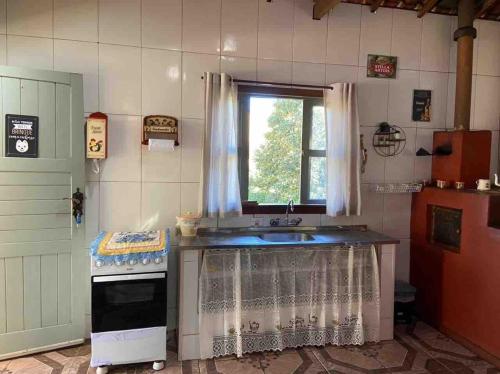 Køkken eller tekøkken på Refúgio da Montanha