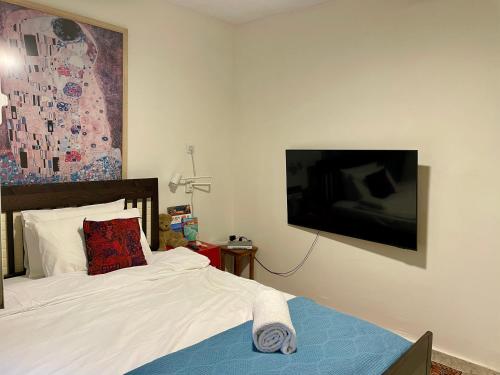 Giường trong phòng chung tại Pleasant