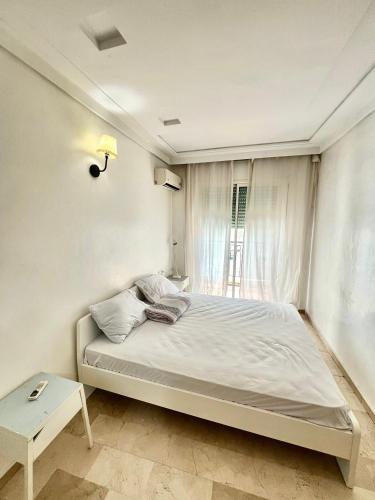 Postel nebo postele na pokoji v ubytování Le repos parfait