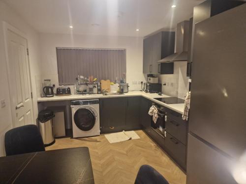 Η κουζίνα ή μικρή κουζίνα στο A spacious double room in a peaceful area