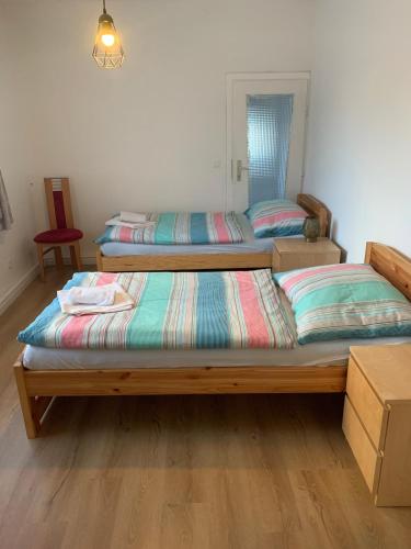 Ένα ή περισσότερα κρεβάτια σε δωμάτιο στο Cozy house with garden and bbq near Vienna