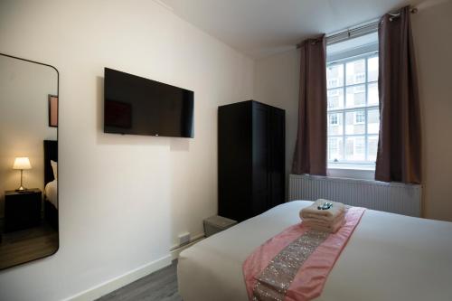 TV a/nebo společenská místnost v ubytování Bennet House