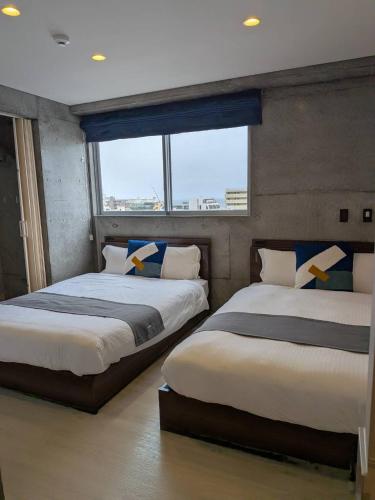 Giường trong phòng chung tại Arahastay