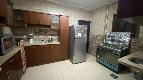 Kuchyň nebo kuchyňský kout v ubytování Shaer House