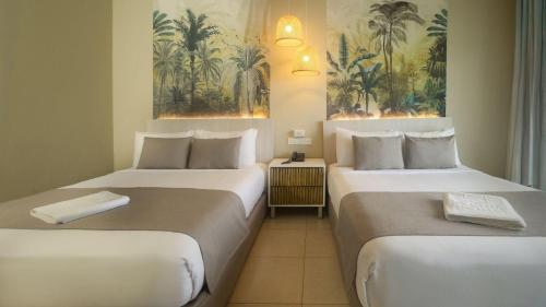 Postel nebo postele na pokoji v ubytování Gran Evenia Bijao - All Inclusive