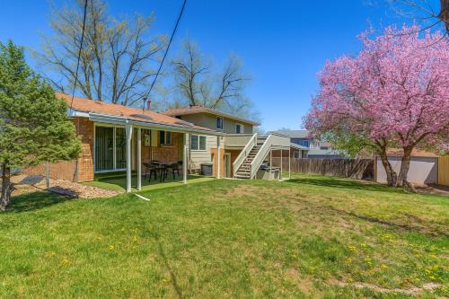 a house with a tree in the yard at #Marbella Lane - Modern & Spacious 4BR Retreat in Arvada in Arvada