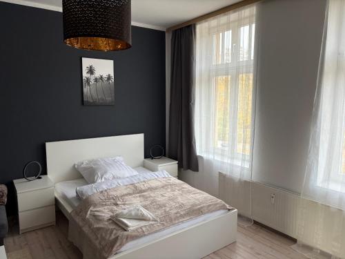 Ένα ή περισσότερα κρεβάτια σε δωμάτιο στο Parkblick