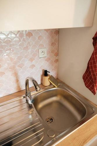a stainless steel kitchen sink in a kitchen at Altitude 1745 - Mountain view in Font-Romeu