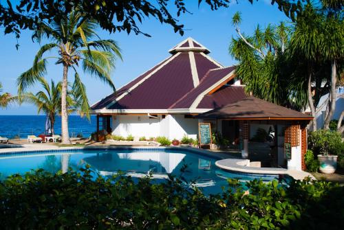 Bazén v ubytování Quo Vadis Dive Resort nebo v jeho okolí