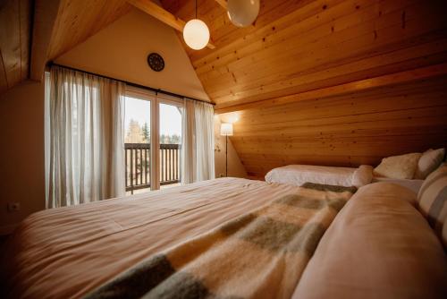 Ένα ή περισσότερα κρεβάτια σε δωμάτιο στο Nord Hill - Zlatar Hill - kuća za odmor