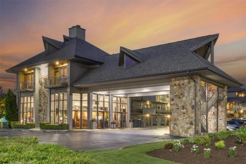 a large building with a black roof at Best Western Plaza Inn in Pigeon Forge