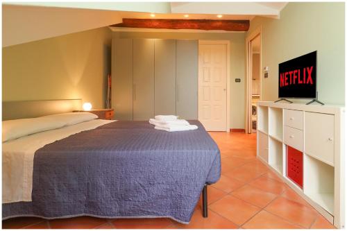 Ένα ή περισσότερα κρεβάτια σε δωμάτιο στο MoleView Nest on the Turin rooftops WIFI AC