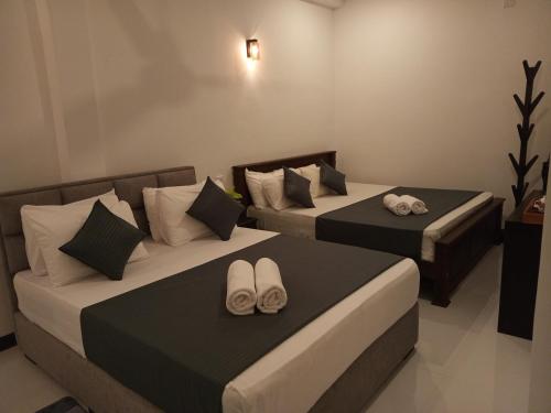 Postel nebo postele na pokoji v ubytování COCO house