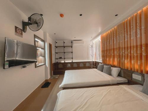 Postel nebo postele na pokoji v ubytování Chi's House Cao Bang