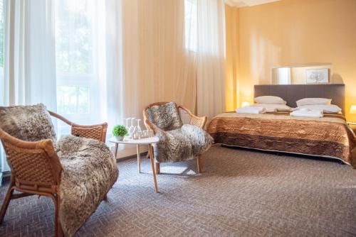 Ένα ή περισσότερα κρεβάτια σε δωμάτιο στο Hotel Yes