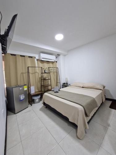Confortable y Central Habitación a 1 cuadra de la playa y malecón