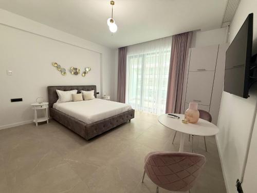 En eller flere senge i et værelse på Holidays Sea Vibes One