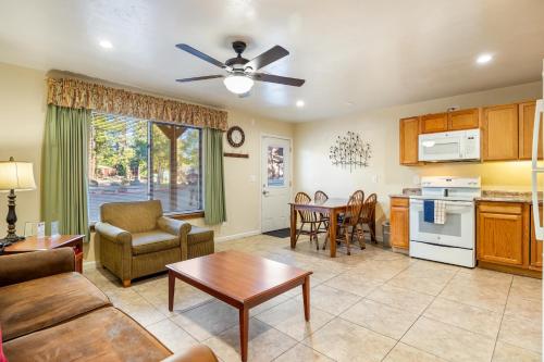 a living room with a couch and a table at Pine-Santa Fe by Roundhouse Resort and Spa in Indian Pine