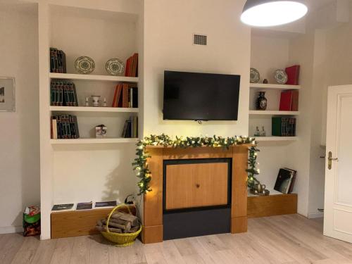 TV a/nebo společenská místnost v ubytování Casetta in collina 4