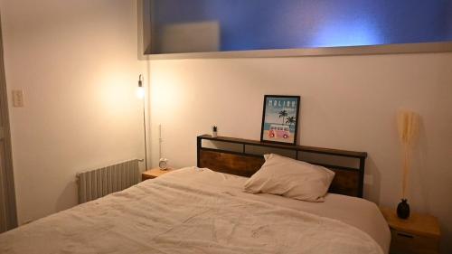 Cama o camas de una habitación en Appartement hyper-centre Épinal