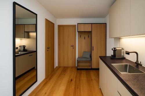 Η κουζίνα ή μικρή κουζίνα στο Panorama Zillertal Loft - Opening December 2025